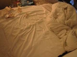voyeurcam-julmodels-whitebed-1 webcam model stream image